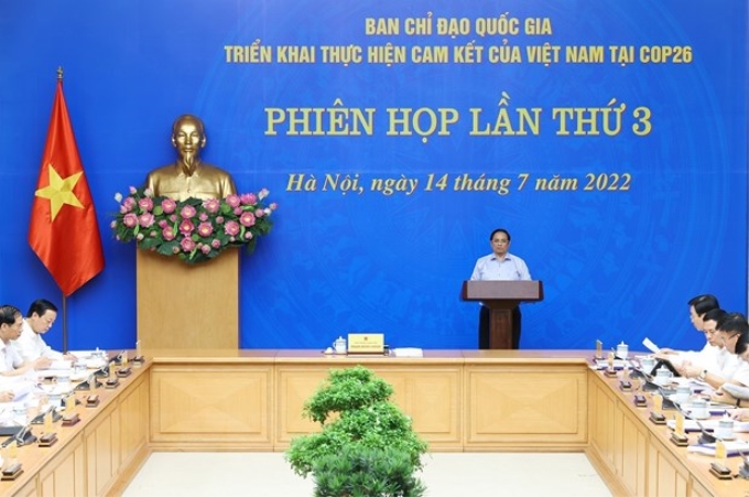 Thủ tướng Phạm Minh Chính chủ trì Phiên họp lần thứ 3 Ban Chỉ đạo Quốc gia triển khai thực hiện cam kết của Việt Nam tại COP26. (Ảnh: Dương Giang/TTXVN)