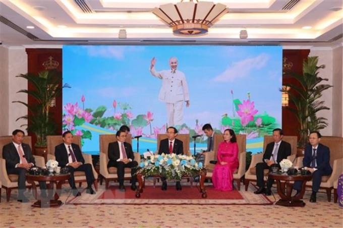 Bí thư Thành ủy Thành phố Hồ Chí Minh Nguyễn Văn Nên và các đại biểu tại buổi tiếp. (Ảnh: TTXVN)