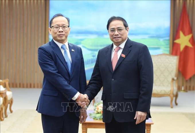 Thủ tướng Phạm Minh Chính tiếp Đại sứ Vương quốc Campuchia Chay Navuth. Ảnh: Dương Giang/TTXVN
