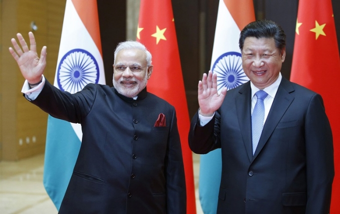 Cạnh tranh chiến lược giữa Trung Quốc và Ấn Độ tại khu vực Nam Á đã và đang tác động không nhỏ đến các quốc gia trong khu vực. (Trong ảnh: Thủ tướng Ấn Độ Narendra Modi và Tổng Bí thư, Chủ tịch Trung Quốc Tập Cận Bình tại tỉnh Thiểm Tây, Trung Quốc). (Ảnh: AFP)