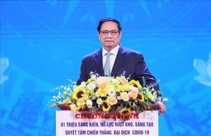 Thủ tướng Phạm Minh Chính phát biểu tại Lễ tôn vinh điển hình “Sáng kiến vượt khó, sáng tạo, chiến thắng đại dịch”. Ảnh: Dương Giang/TTXVN