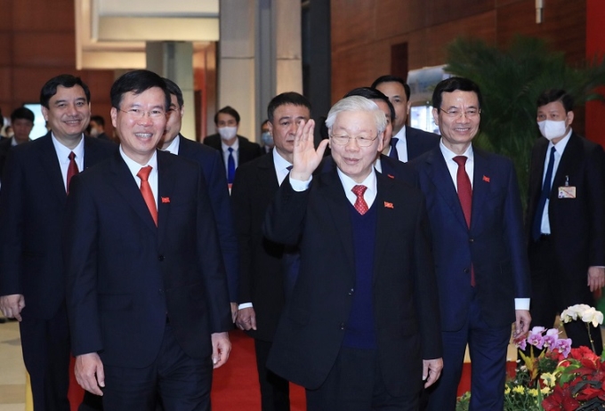 Tổng Bí thư Nguyễn Phú Trọng với các đồng chí lãnh đạo Đảng, Nhà nước và các đạị biểu dự Đại hội đại biểu toàn quốc lần thứ XIII của Đảng. (Ảnh: TTXVN)
