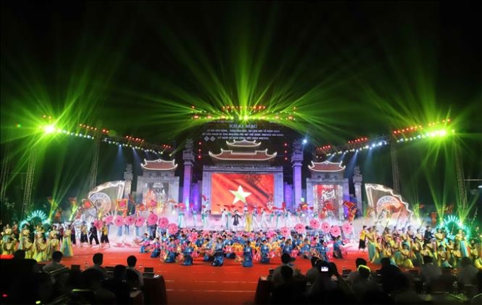 Tiết mục nghệ thuật chào mừng trong đêm khai mạc Lễ hội Đền Hùng và kỷ niệm 20 năm Công ước 2003 của UNESCO. Ảnh: Trung Kiên/TTXVN