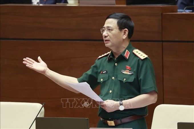 Đại tướng Phan Văn Giang, Bộ trưởng Bộ Quốc phòng giải trình, làm rõ một số vấn đề đại biểu Quốc hội nêu. Ảnh: Doãn Tấn/TTXVN