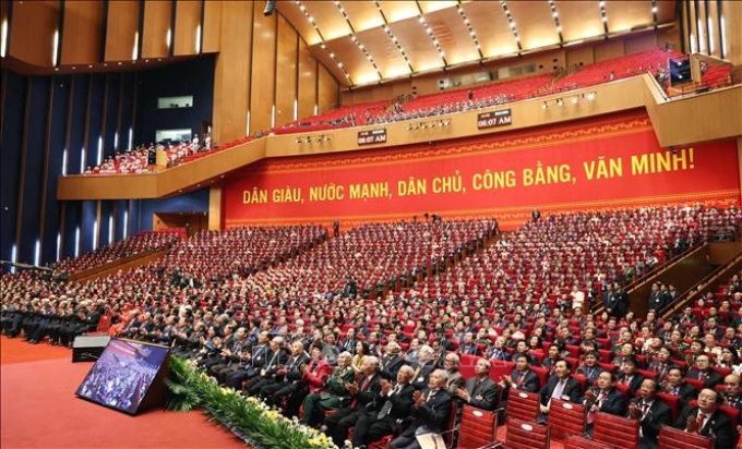 Các đại biểu dự phiên khai mạc Đại hội lần thứ XIII của Đảng. (Ảnh: TTXVN)