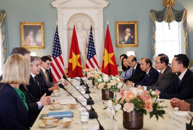 Quang cảnh cuộc làm việc của Trưởng Ban Đối ngoại Trung ương Lê Hoài Trung và Ngoại trưởng Hoa Kỳ Antony Blinken. (Ảnh: TTXVN)