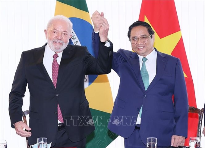 Thủ tướng Phạm Minh Chính với Tổng thống Brazil Lula da Silva . Ảnh: Dương Giang/TTXVN