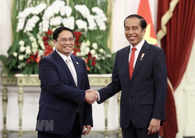 Thủ tướng Phạm Minh Chính hội kiến Tổng thống Indonesia Joko Widodo. (Ảnh: TTXVN)