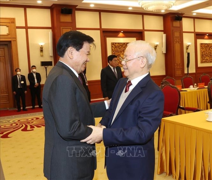 Tổng Bí thư Nguyễn Phú Trọng đón Tổng Bí thư, Chủ tịch nước Lào Thongloun Sisoulith. (Ảnh: TTXVN)