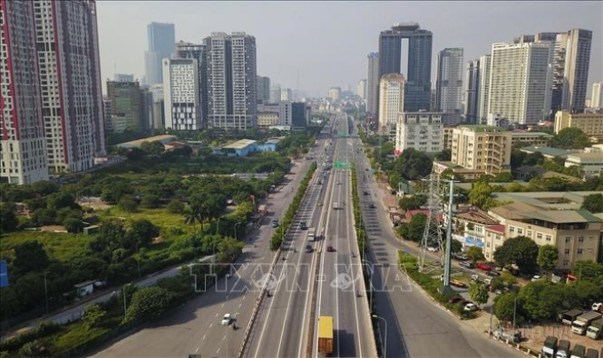 Đường Phạm Văn Đồng dài 5,2 km, thuộc tuyến đường Vành đai 3, là trục giao thông huyết mạch nối huyện Đông Anh và các tỉnh phía Bắc vào khu trung tâm thành phố Hà Nội. (Ảnh: TTXVN)
