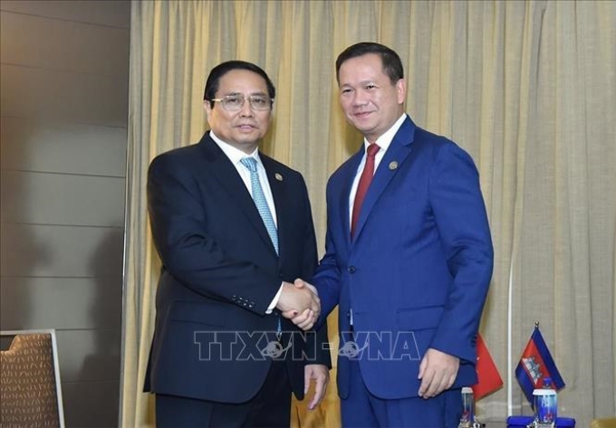 Thủ tướng Phạm Minh Chính gặp Thủ tướng Campuchia Hun Manet. Ảnh: Dương Giang/TTXVN