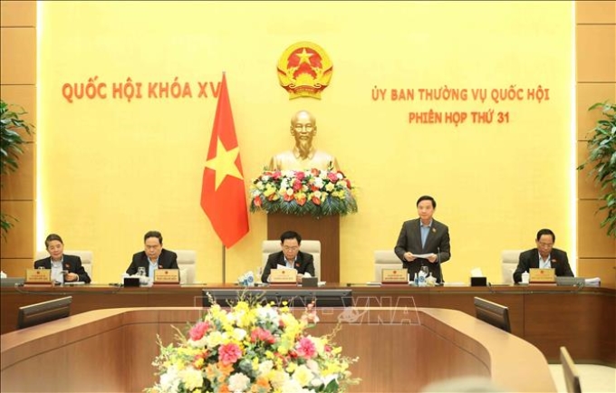 Phó Chủ tịch Quốc hội Nguyễn Khắc Định điều hành phiên họp. (Ảnh: TTXVN)