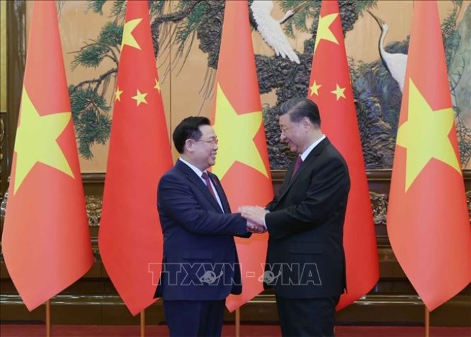 Chủ tịch Quốc hội Vương Đình Huệ hội kiến Tổng Bí thư, Chủ tịch nước Trung Quốc Tập Cận Bình. (Ảnh: TTXVN)