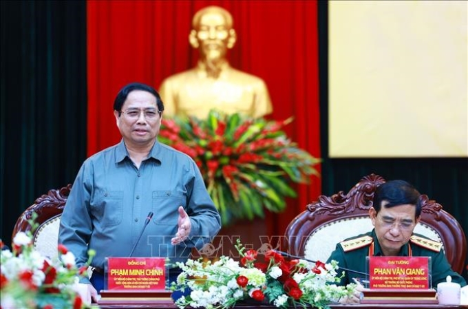 Thủ tướng Phạm Minh Chính phát biểu tại buổi làm việc với Tập đoàn Công nghiệp-Viễn thông Quân đội (Viettel). (Ảnh: TTXVN)