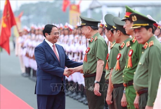 Thủ tướng Phạm Minh Chính với Bộ trưởng Tô Lâm và lãnh đạo Bộ Công an tham dự Lễ kỷ niệm. Ảnh: Dương Giang/TTXVN