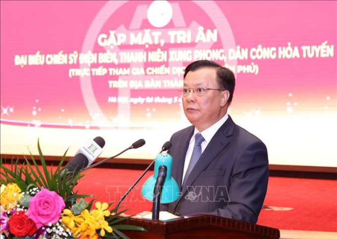 Bí thư Thành ủy Hà Nội Đinh Tiến Dũng phát biểu tại buổi gặp mặt. Ảnh: Văn Điệp/TTXVN