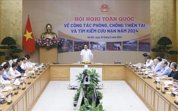 Phó Thủ tướng Chính phủ Trần Lưu Quang phát biểu. (Ảnh: TTXVN)