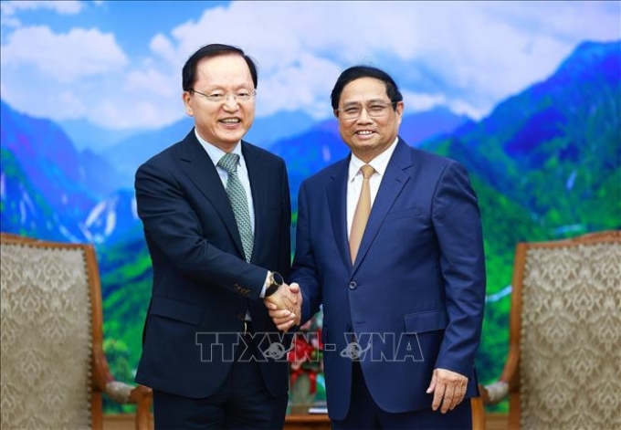 Thủ tướng Phạm Minh Chính tiếp ông Park Hark Kyu, Tổng Giám đốc phụ trách tài chính của Tập đoàn Samsung. (Ảnh: TTXVN)