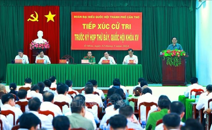 Thủ tướng Phạm Minh Chính phát biểu tại cuộc tiếp xúc cử tri quận Ô Môn, thành phố Cần Thơ. Ảnh: Dương Giang/TTXVN