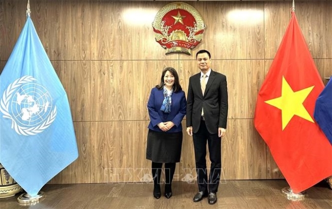 Đại sứ, Trưởng Phái đoàn Thường trực Việt Nam tại LHQ Đặng Hoàng Giang và bà June Kunugi, Giám đốc phụ trách quan hệ đối tác của UNICEF tại cuộc gặp. (Ảnh: TTXVN)