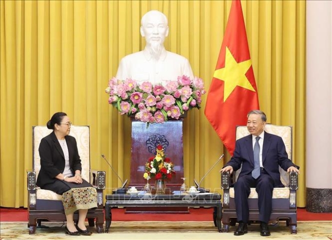 Chủ tịch nước Tô Lâm với Đại sứ Lào Khamphao Ernthavanh, đại diện nước Chủ tịch ASEAN 2024. (Ảnh: TTXVN)