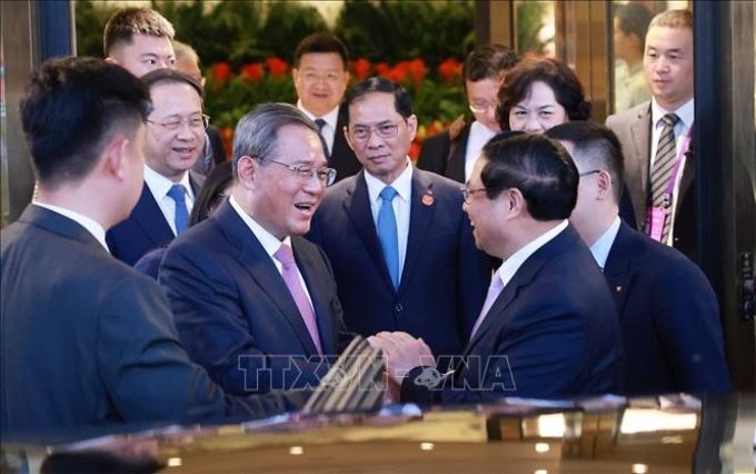 Thủ tướng Phạm Minh Chính và Thủ tướng Trung Quốc Lý Cường. Ảnh: Dương Giang/TTXVN