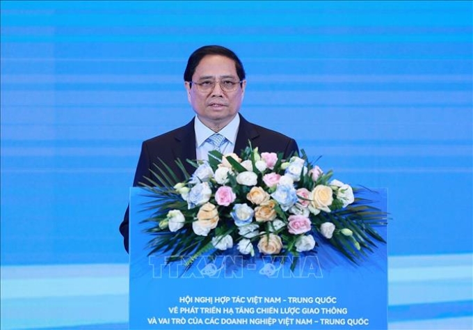 Thủ tướng Phạm Minh Chính phát biểu tại Hội nghị hợp tác Việt Nam - Trung Quốc về phát triển hạ tầng chiến lược giao thông. (Ảnh: TTXVN)