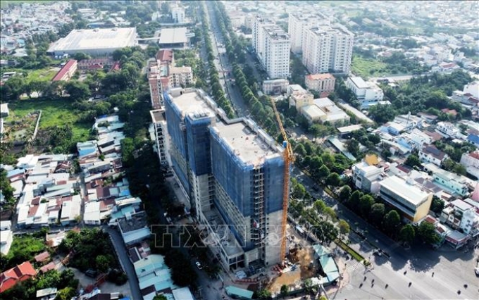 Nhà ở xã hội đang xây dựng tại phường Quang Vinh, thành phố Biên Hòa, tỉnh Đồng Nai. (Ảnh: TTXVN)