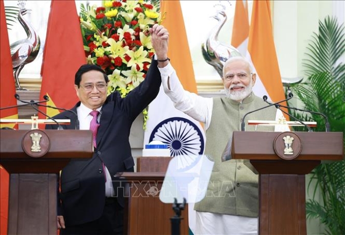 Thủ tướng Phạm Minh Chính​ và Thủ tướng Ấn Độ Narendra Modi tại cuộc gặp gỡ báo chí hai nước. (Ảnh: TTXVN)